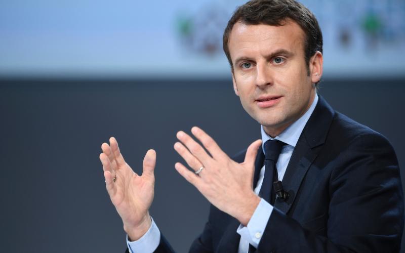 Francoski predsednik Macron za finančne sankcije proti članicam EU, ki zavračajo begunce