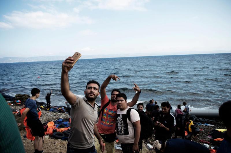 Merklova in Macron Italiji obljubila pomoč pri soočanju z migranti