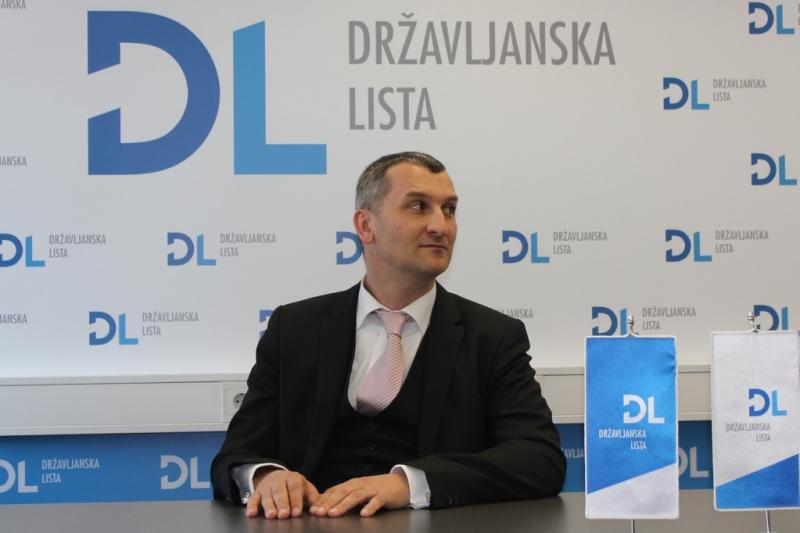 Pogojna kazen za poskus podkupovanja nekdanjega ministra