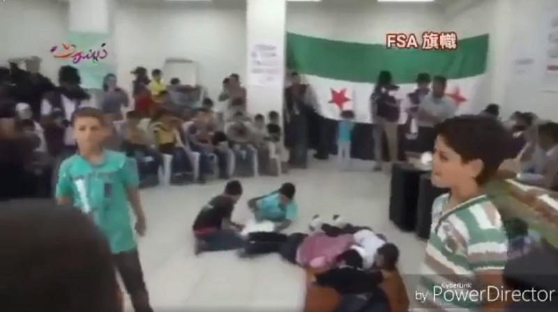 Kako sirski otroci uprizarjajo napad s sarinom