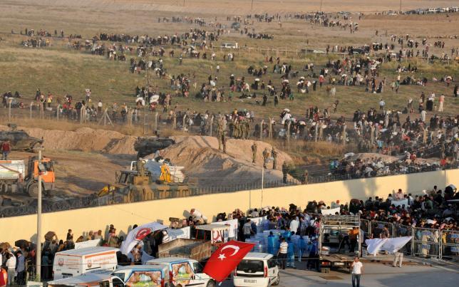 Tusk: Turčija se mora držati svojega dela dogovora o beguncih