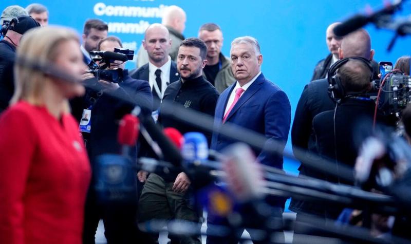 Zakaj je bil Zelenski v Budimpešti videti, kot da bi mu prijal kozarec vodke?
