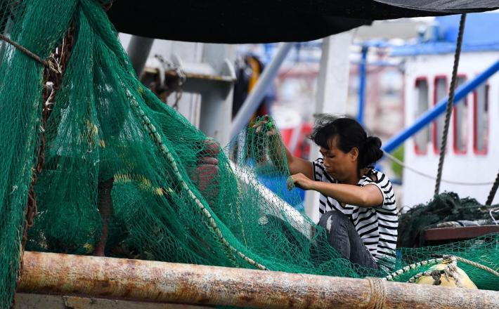 Ribič iz pokrajine Mangkhut  Vir:Pixell