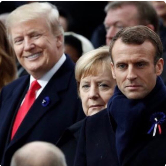 Trump nasmejan ob prihodu Putina, Merklova in Macron pa namrgodena.