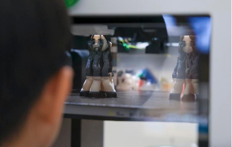 Opazovanje 3D tiskalnika med delom Vir: Xinhua