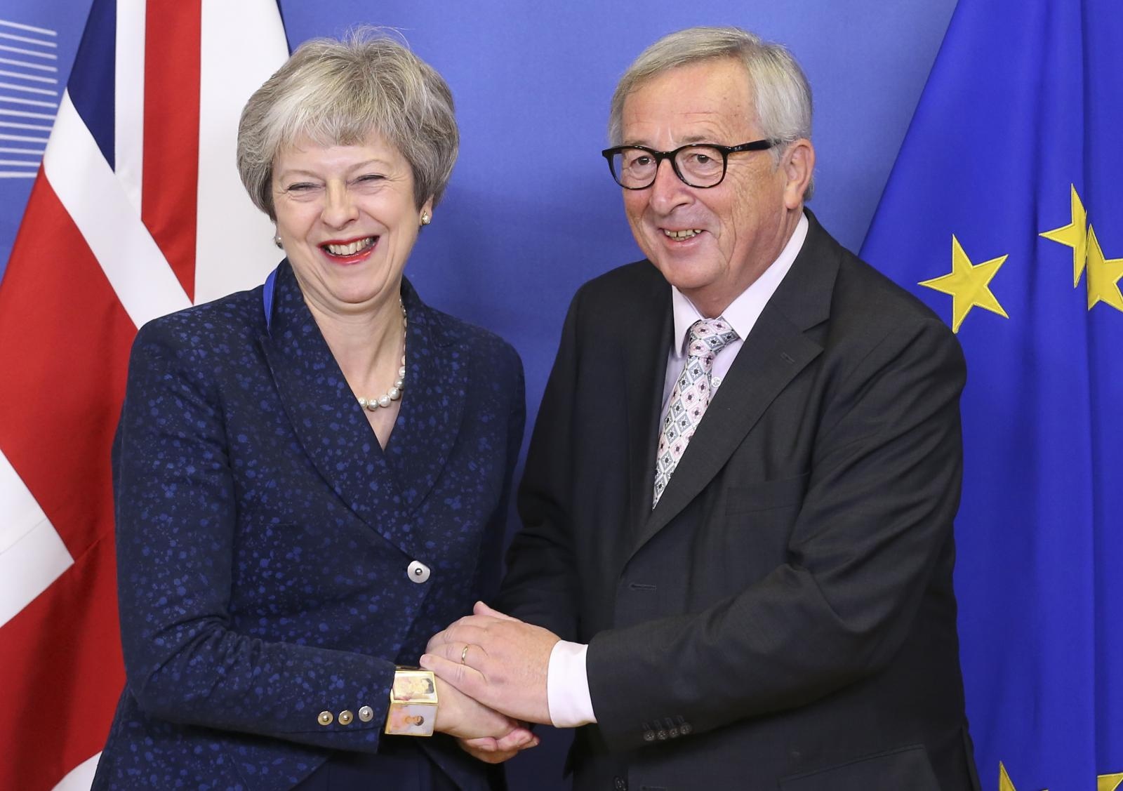 Theresa May in Jean Claude Juncker Vir:Pixell
